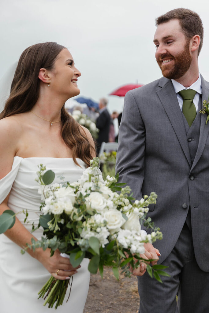 Bride and groom walking back down aisle at Homestead 1880 in Ottawa, ON.