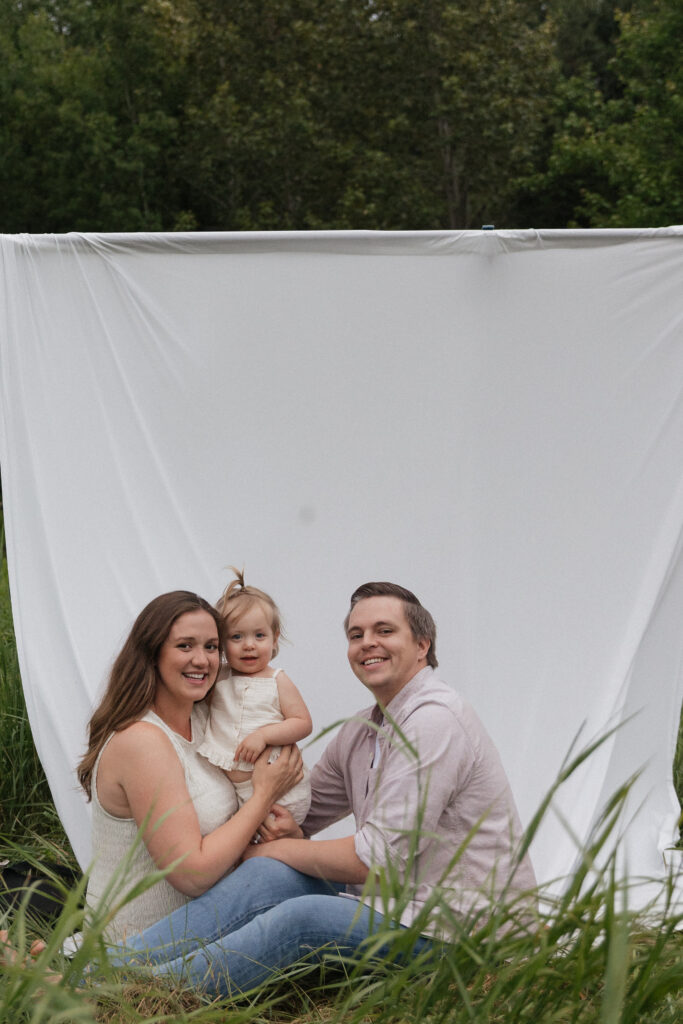 white sheet in the field in Pembroke, Ontario family maternity session