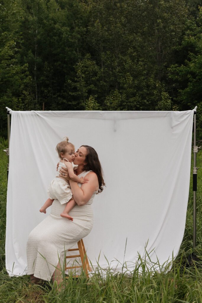 white sheet in the field in Pembroke, Ontario family maternity session