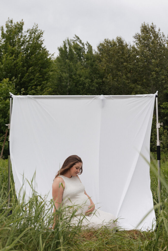 white sheet in the field in Pembroke, Ontario family maternity session