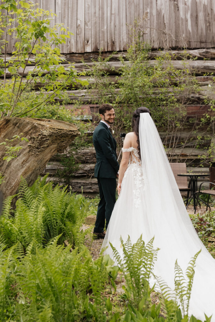 Bride and groom first look at The Herb Garden in Almonte, ON.