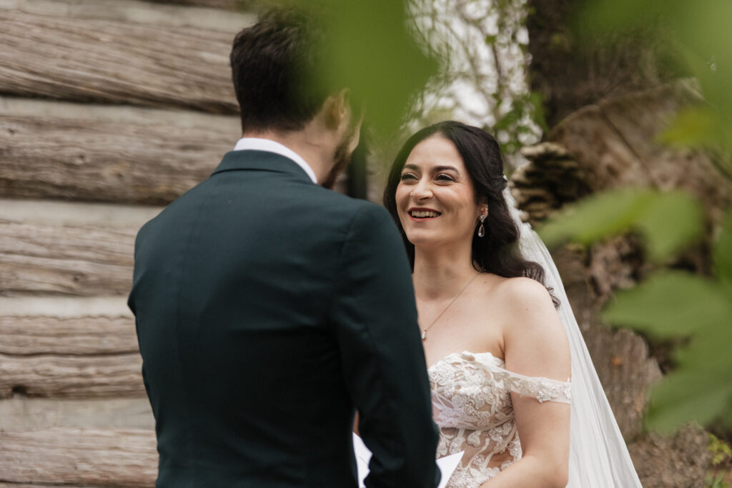Bride and groom first look and vow reading at The Herb Garden in Almonte, ON.