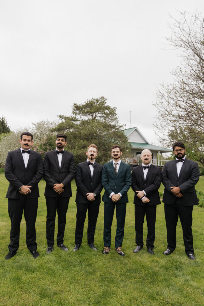 Groom and groomsmen photos at the Herb Garden in Almonte, ON.