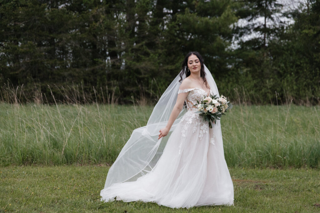 Bridal portrait in a field at The Herb Garden in Almonte, ON. 