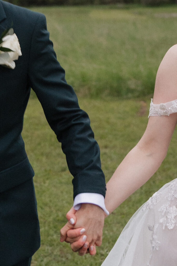 Bride and groom portrait in a field at The Herb Garden in Almonte, ON at golden hour. 